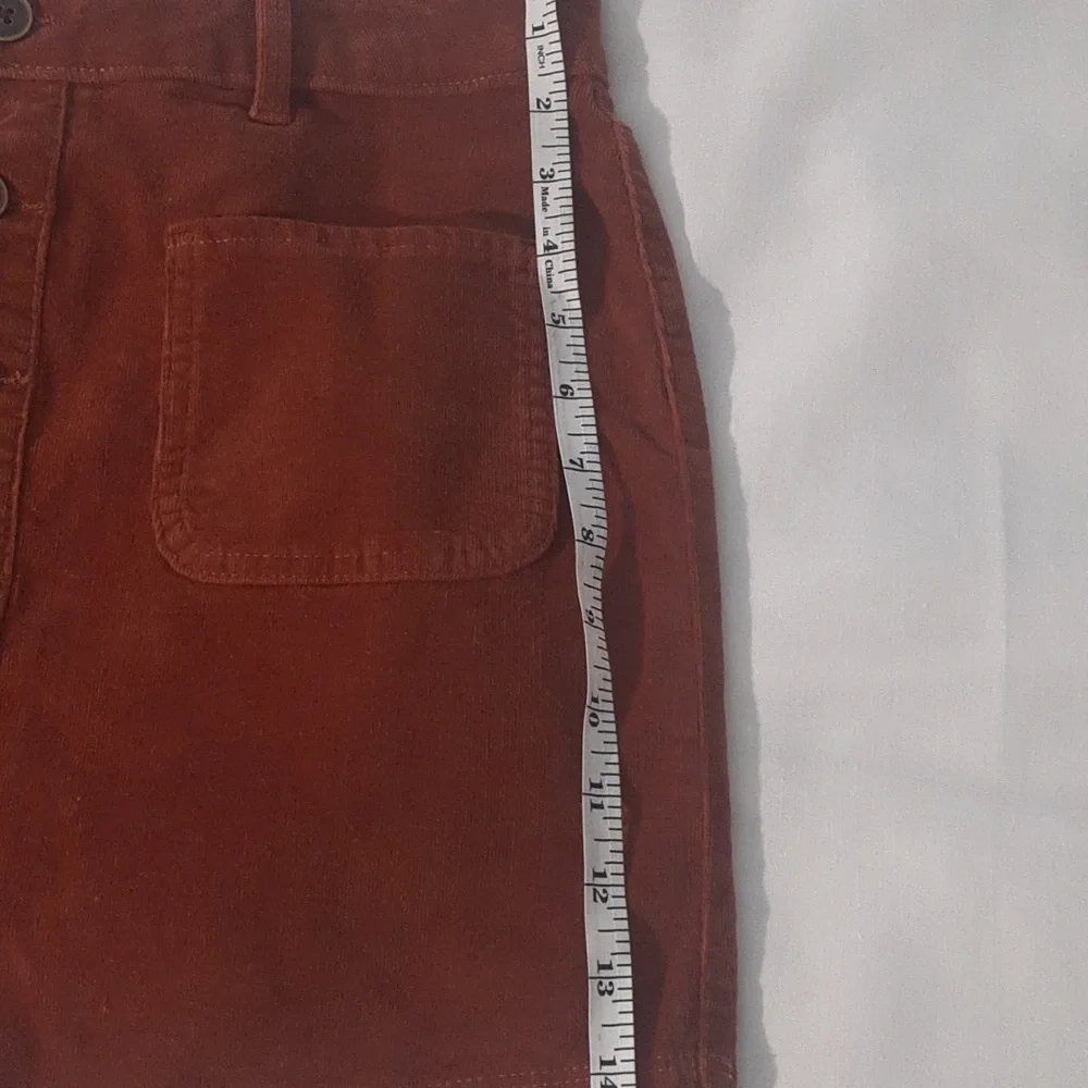 SO Girls Size 16 Corduroy skirt. Burnt‎ Orange, NWOT. Waist sinches to fit.
